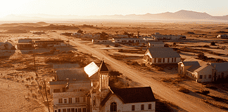 The Legend of Kolmanskop: The Diamond Kingdom Beneath the Sands Illustration of Kolmanskop, a mythical realm inspired by Kolmanskop, central to folklore.